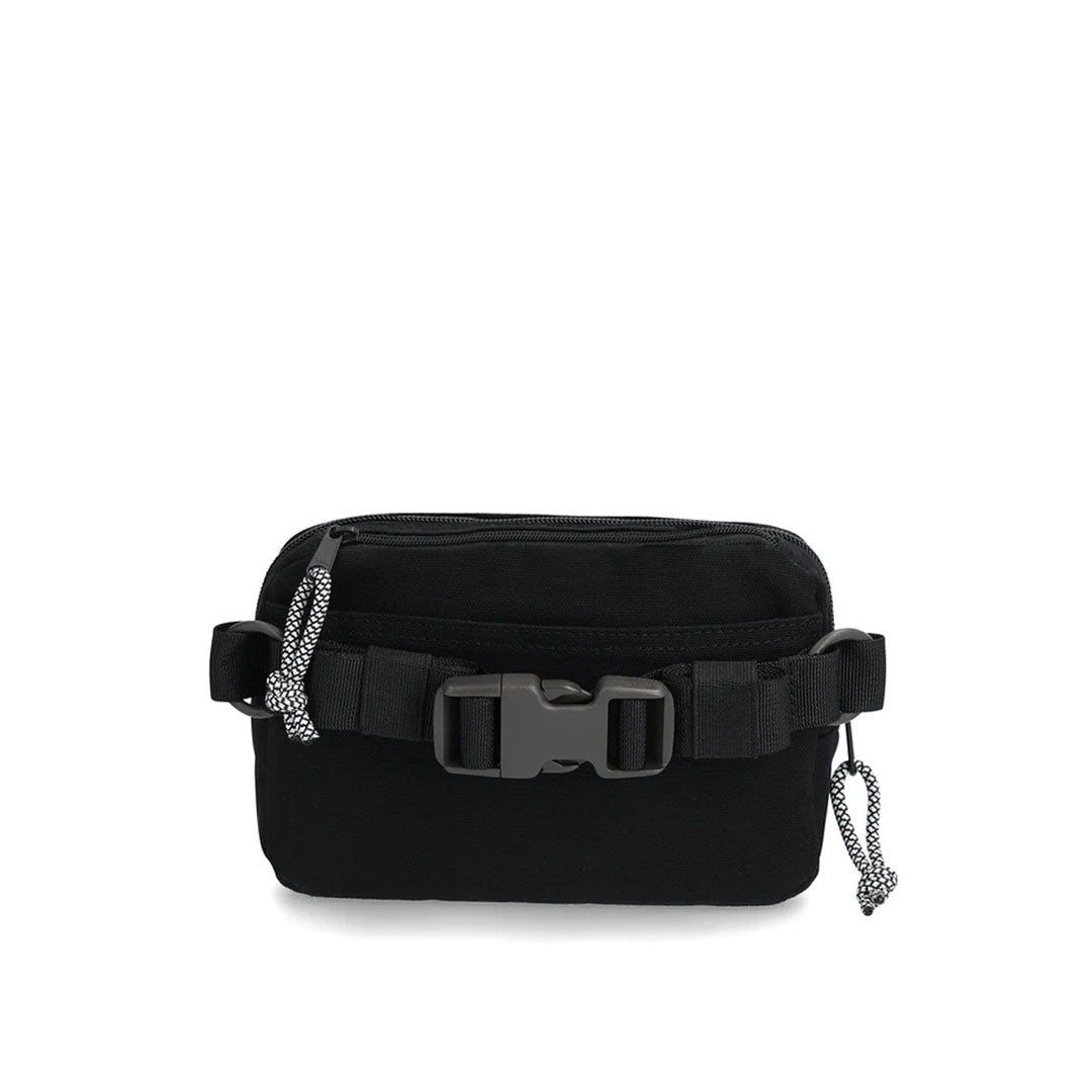 A backside view of a black dirt belt bag with zippered compartments and an adjustable web belt, featuring the TOPO brand logo.