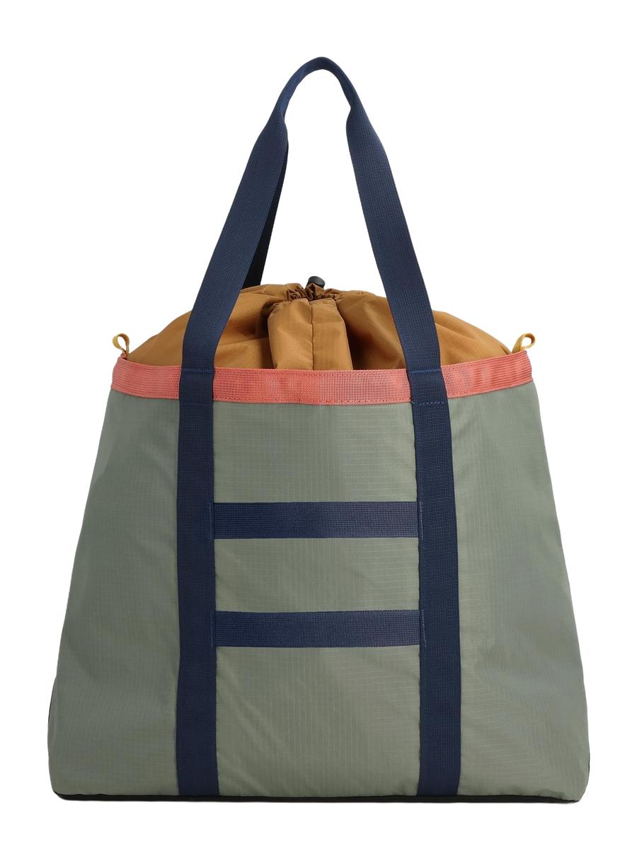 A backside view of a multicolored Mountain Utility Tote Shoulder Bag with a gray base, yellow and pink accents, and a navy blue adjustable padded shoulder strap.