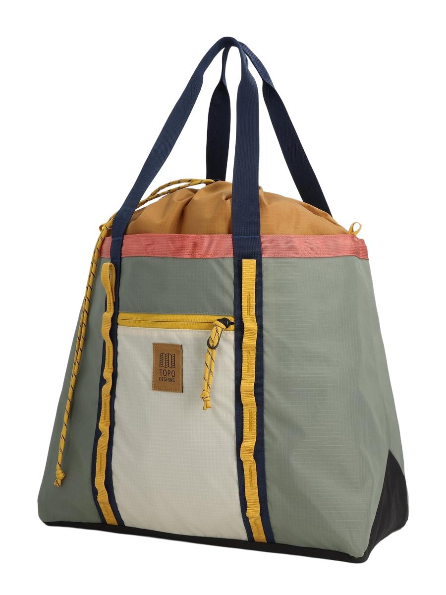 A multicolored Mountain Utility Tote Shoulder Bag with a gray base, yellow and pink accents, and a navy blue adjustable padded shoulder strap.
